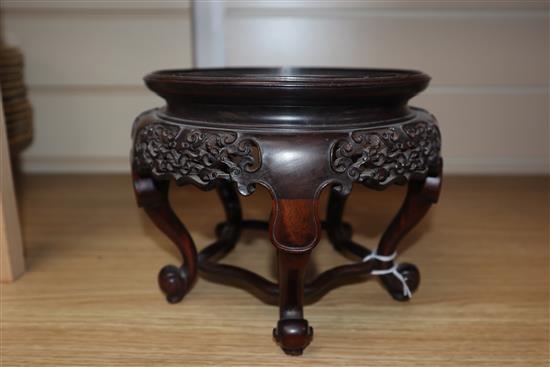 A Chinese carved hardwood vase stand height 15.5cm